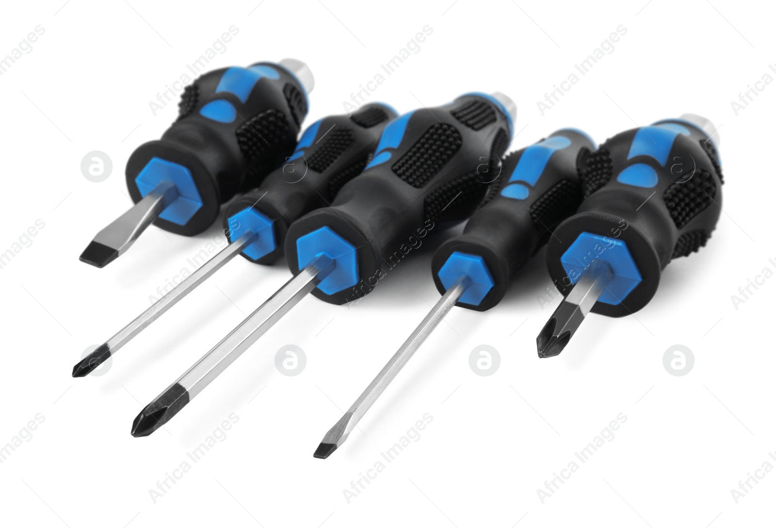 Photo of Set of screwdrivers with blue handles isolated on white