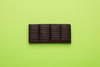Photo of Hematogen bar on green background, top view
