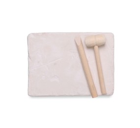 Educational toy for motor skills development. Excavation kit (plaster and digging tools) isolated on white, top view