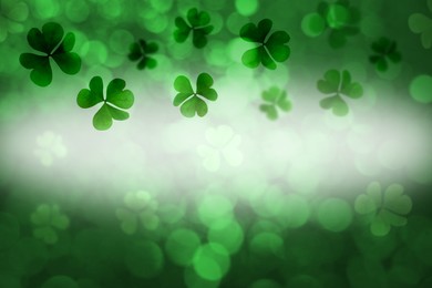 Image of St. Patrick's Day greeting card design with clover leaves, bokeh effect