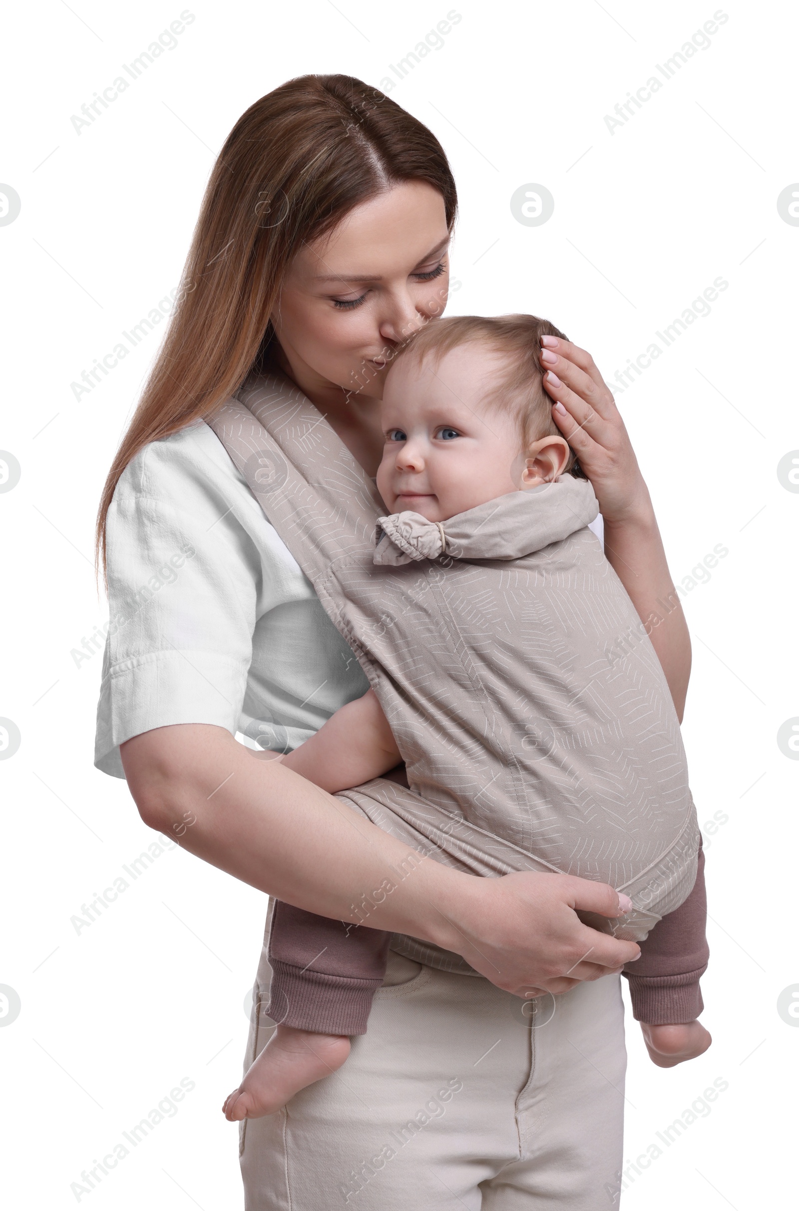 Photo of Mother holding her child in sling (baby carrier) on white background