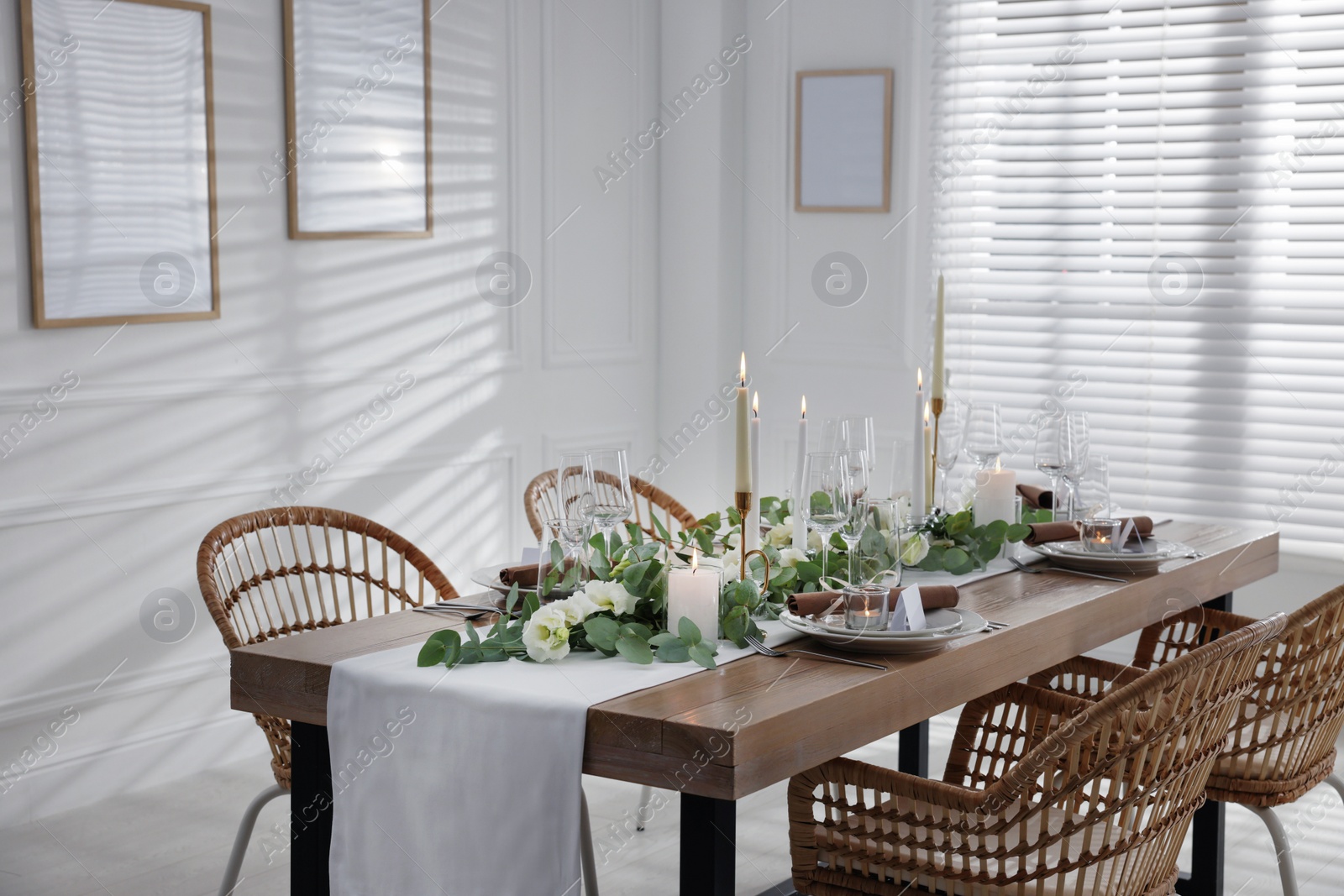 Photo of Festive table setting with beautiful tableware and decor indoors