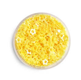 Photo of Yellow sequins in shape of stars on white background, top view