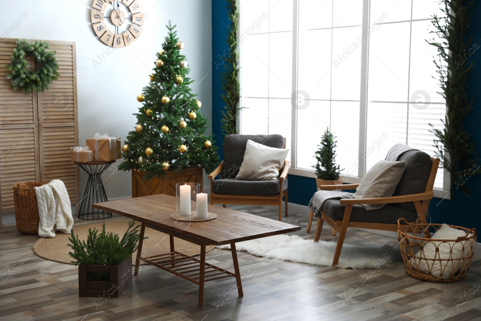 Photo of Beautiful interior with decorated Christmas tree in living room