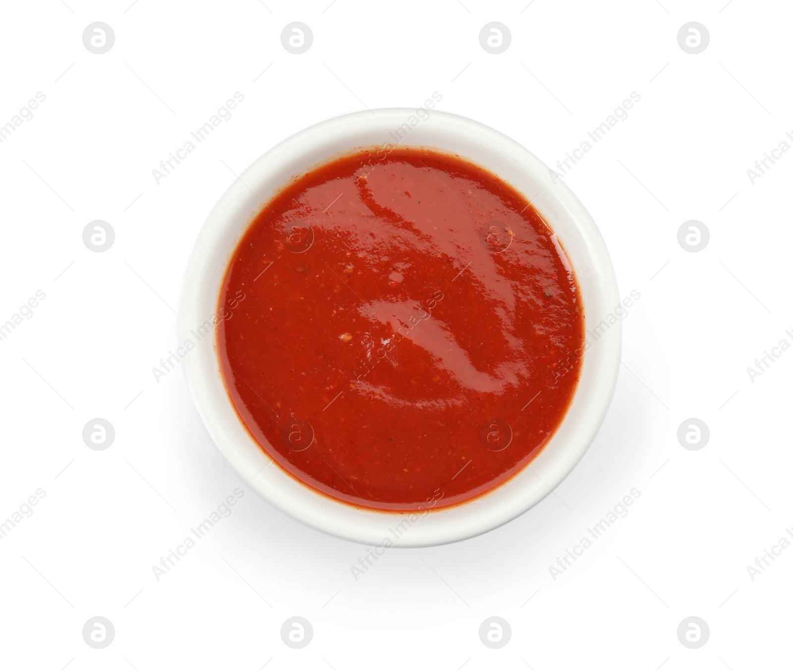 Photo of Bowl of tasty tomato sauce isolated on white, top view