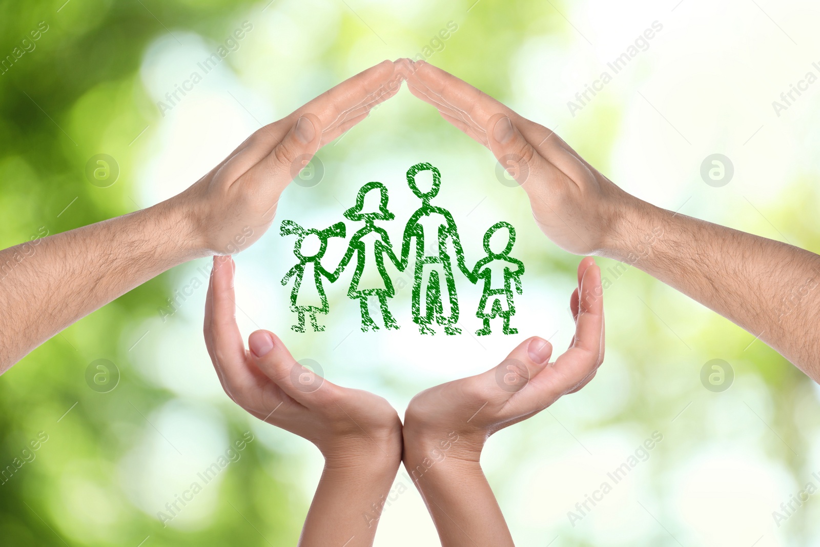 Image of People forming house with their hands and illustration of family on blurred green background, closeup