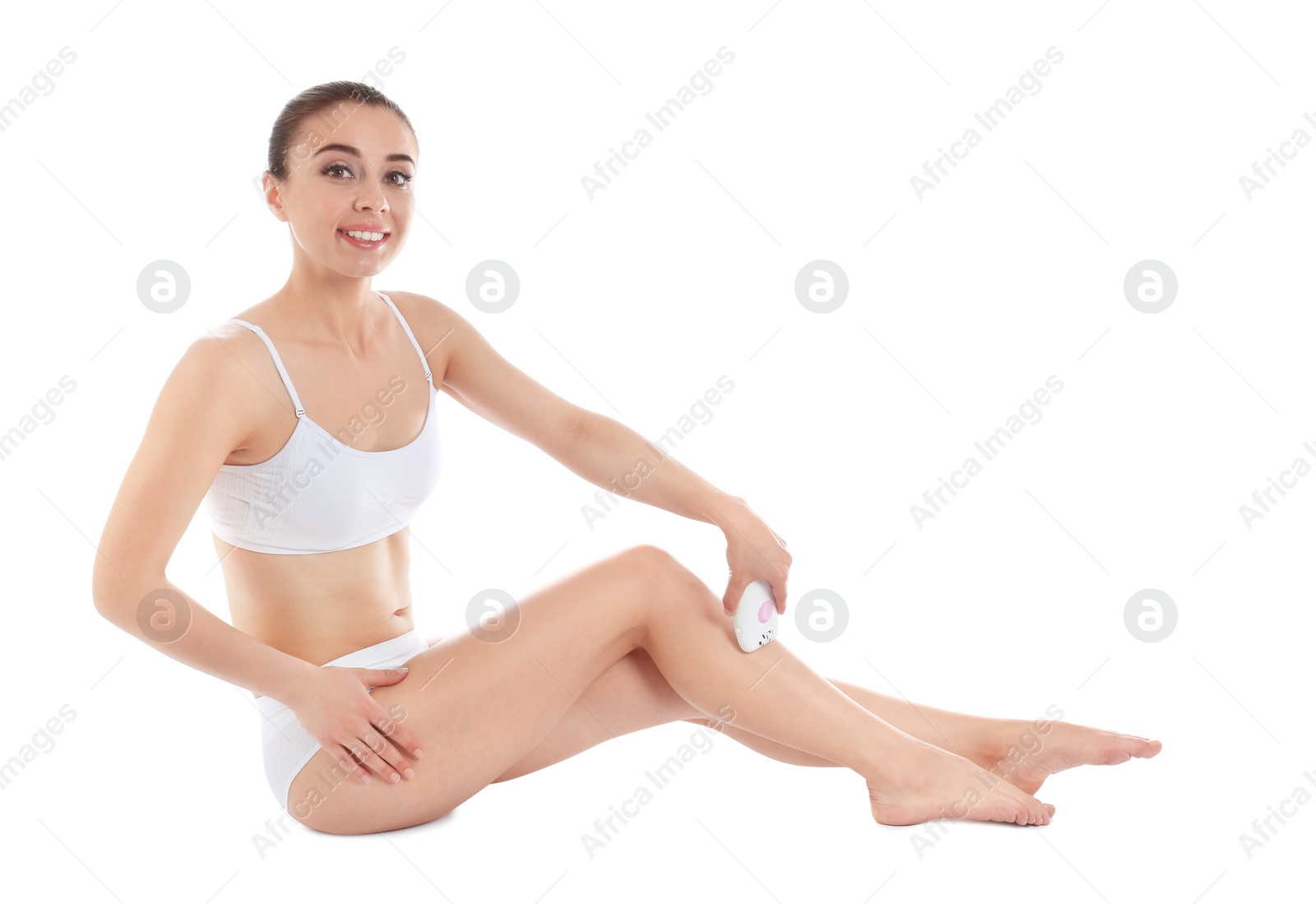 Photo of Woman doing leg epilation procedure isolated on white