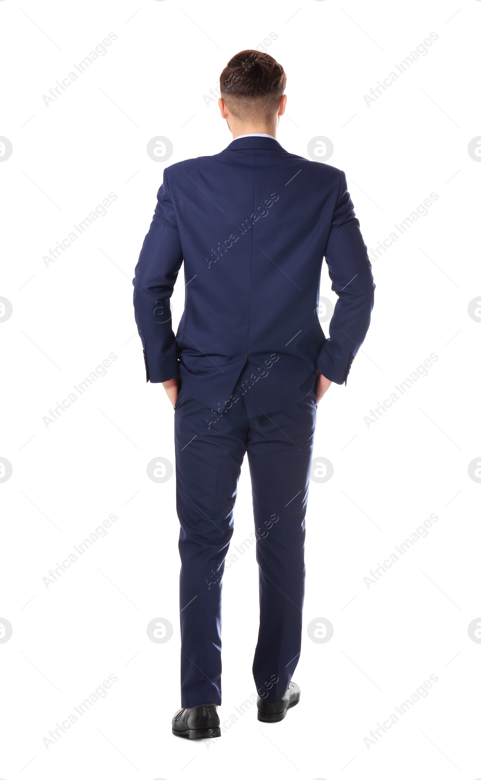 Photo of Businessman in stylish suit posing on white background