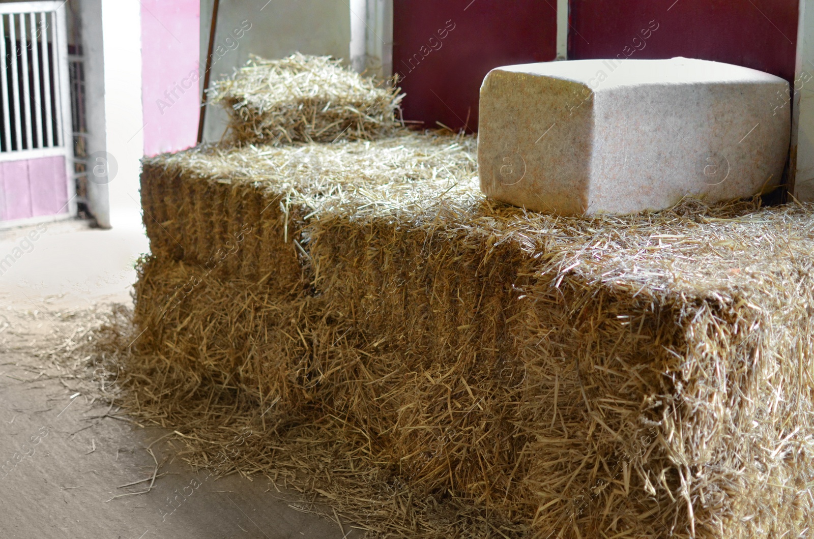 Photo of Many hay bales in farm indoors, closeup