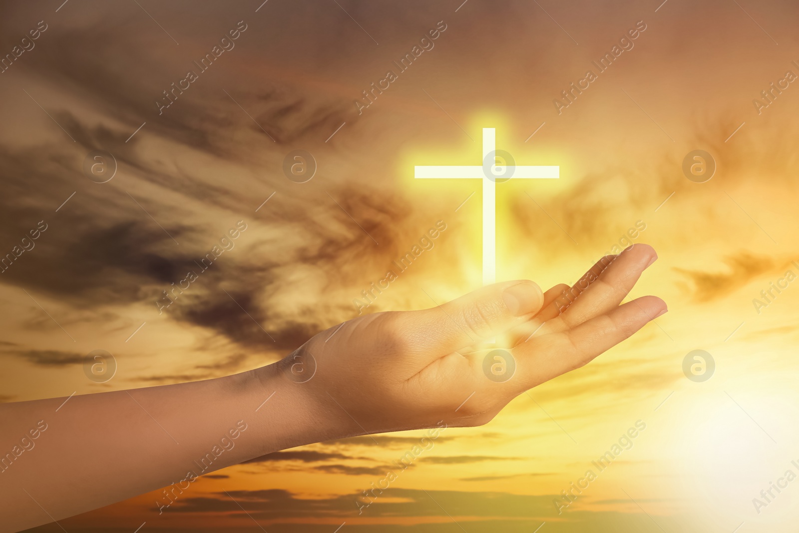 Image of Woman and cross silhouette outdoors, closeup view. Belief in Jesus Christ 