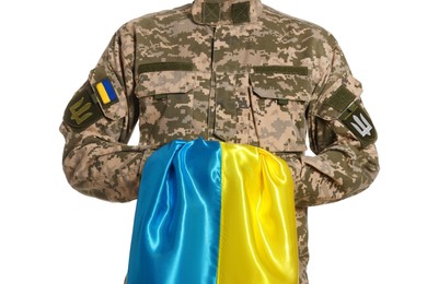 Photo of Soldier in military uniform with Ukrainian flag on white background, closeup