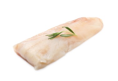 Photo of Piece of raw cod fish and rosemary isolated on white