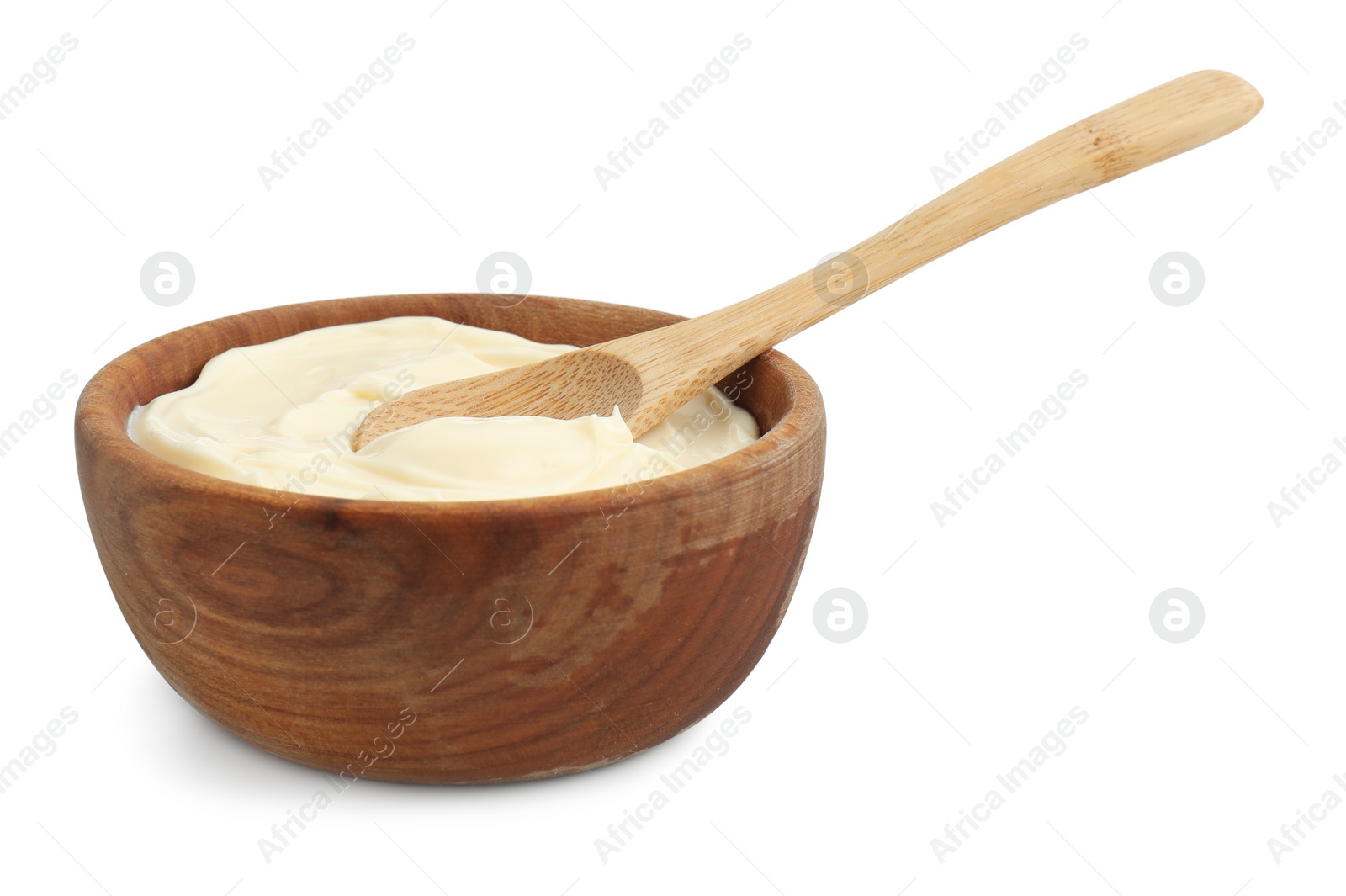 Photo of Bowl with mayonnaise sauce and spoon isolated on white