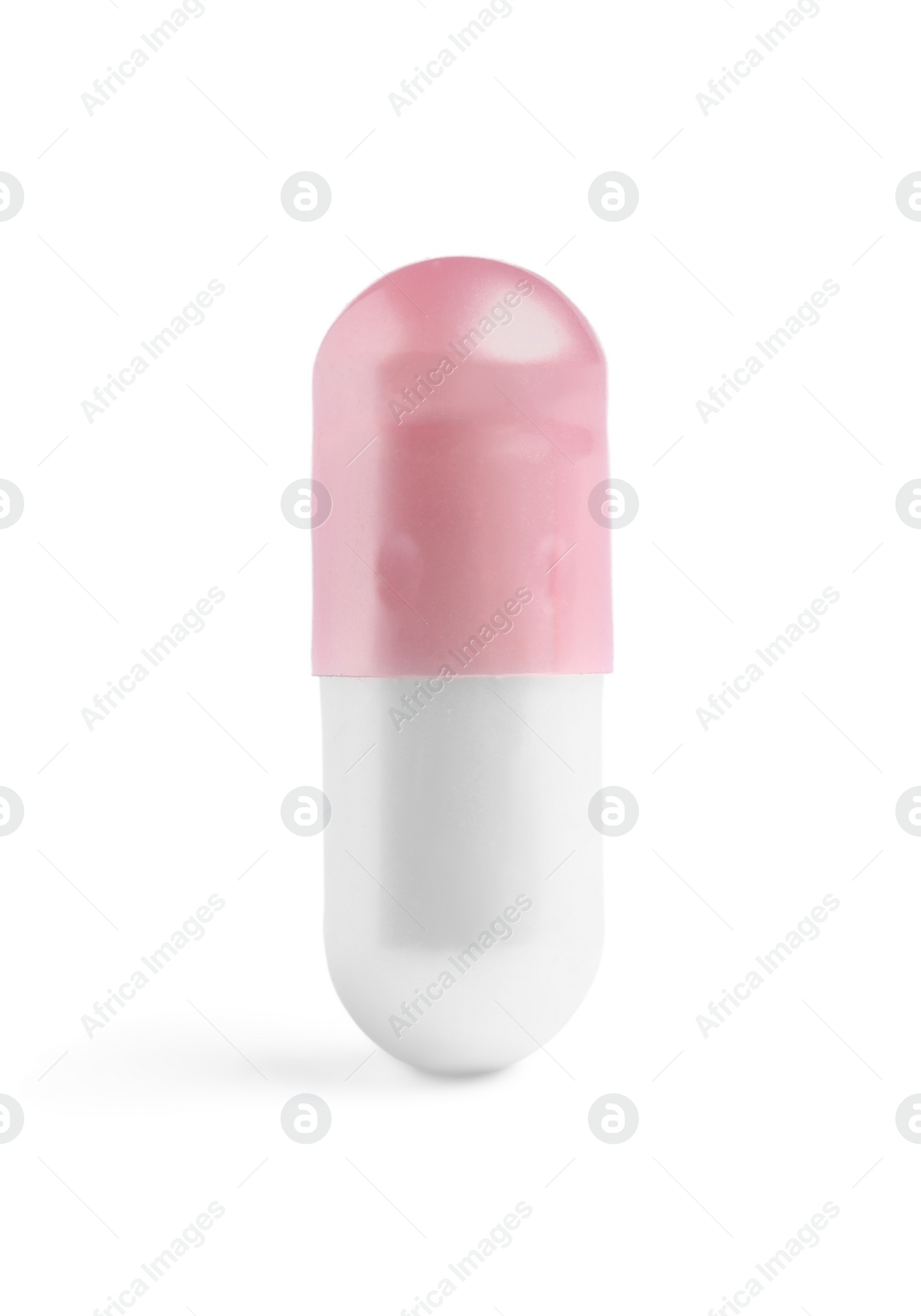 Photo of One pill on white background. Medicinal treatment