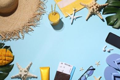 Flat lay composition with passport, tickets and beach accessories on light blue background, space for text. Time to travel