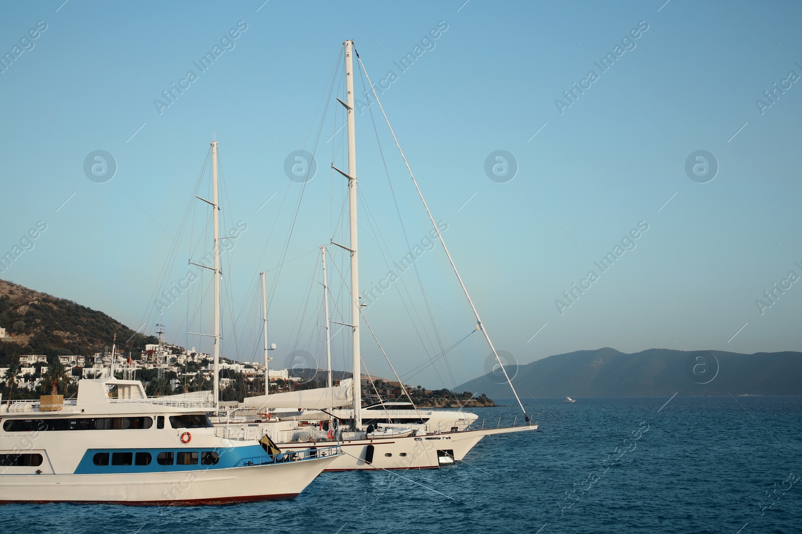 Photo of Picturesque view of boats moored in sea port