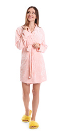 Photo of Young woman in bathrobe on white background