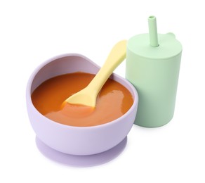 Photo of Healthy baby food in bowl and drink on white background