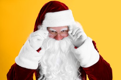 Portrait of Santa Claus on yellow background