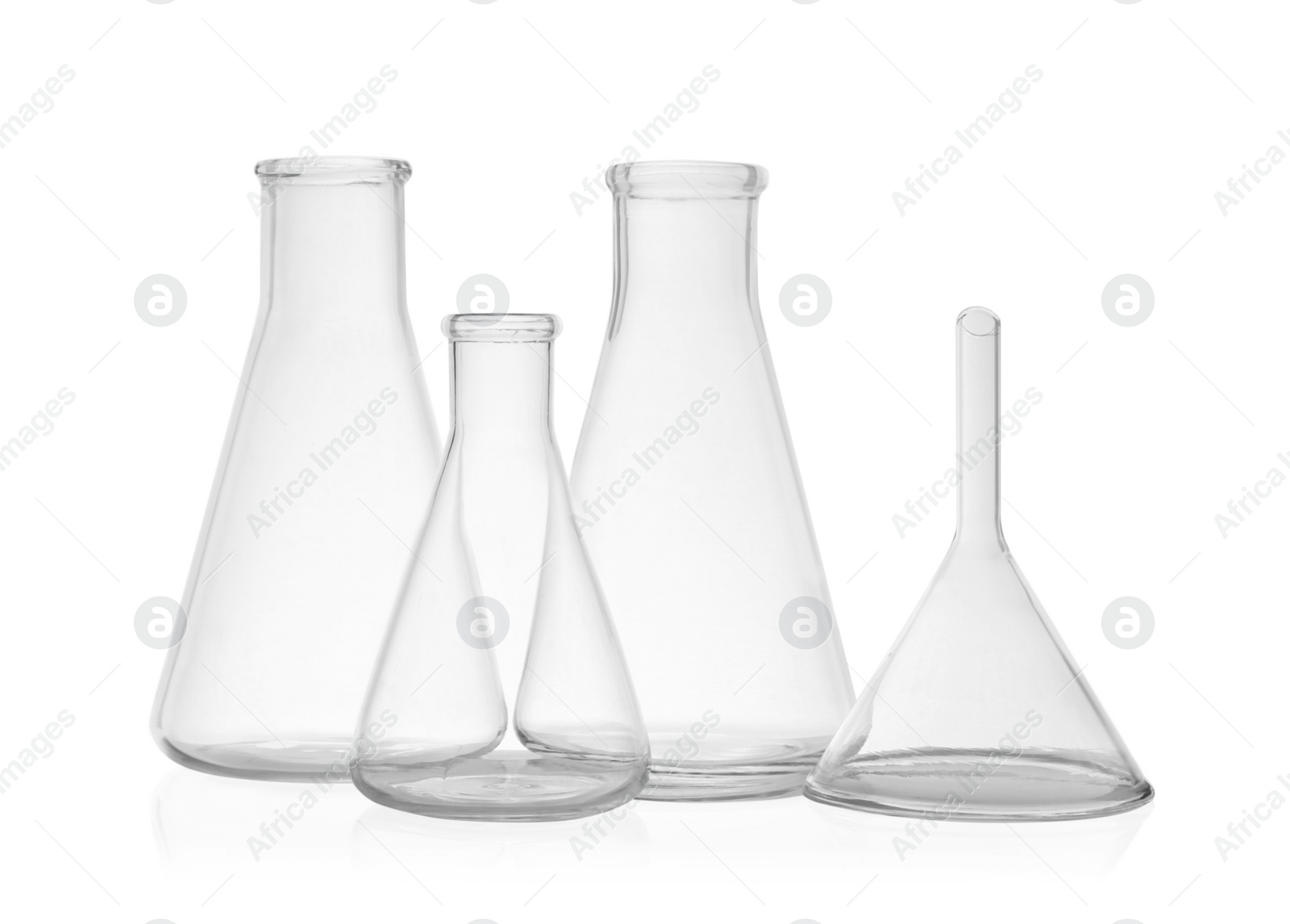 Photo of Set of laboratory glassware on white background