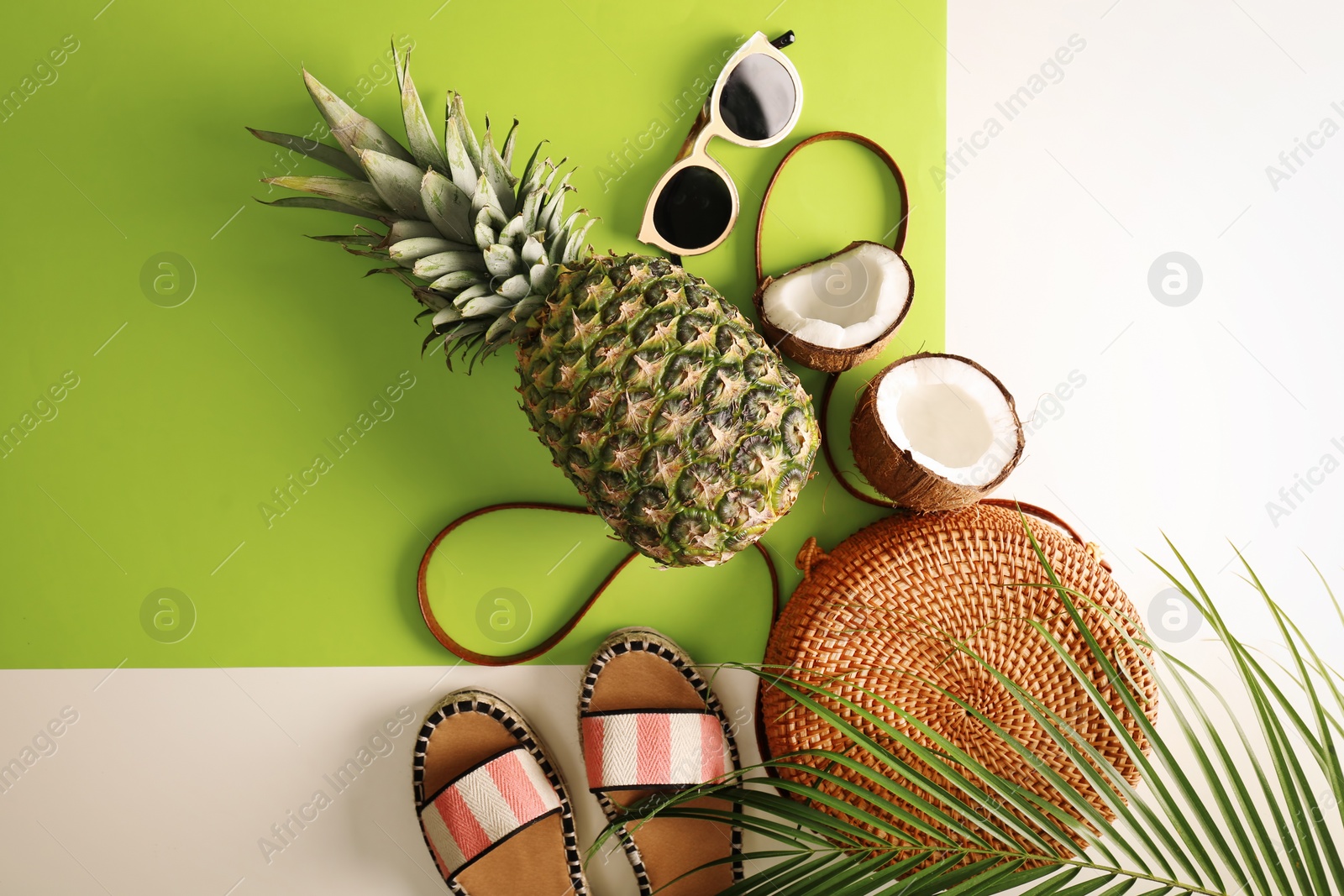 Photo of Flat lay composition with bamboo bag and beach items on color background