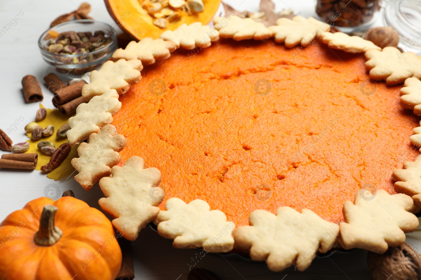 Photo of Delicious homemade pumpkin pie on table, closeup