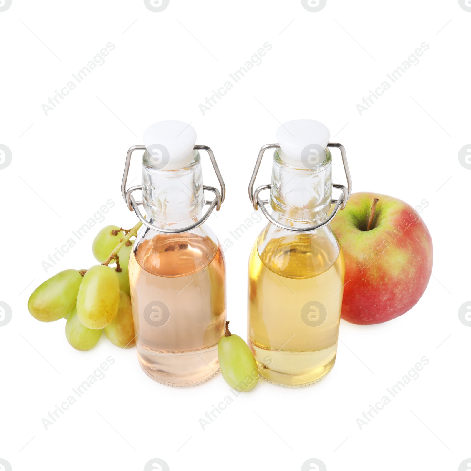 Photo of Different types of vinegar and ingredients isolated on white