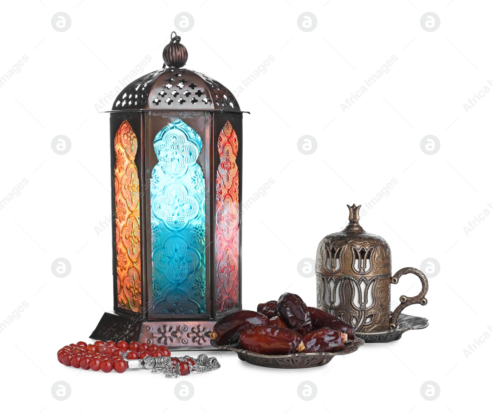 Photo of Decorative Arabic lantern, misbaha, dates and coffee on white background