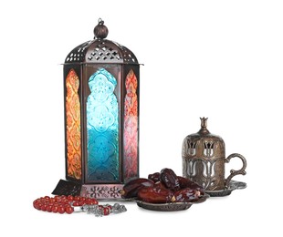 Decorative Arabic lantern, misbaha, dates and coffee on white background