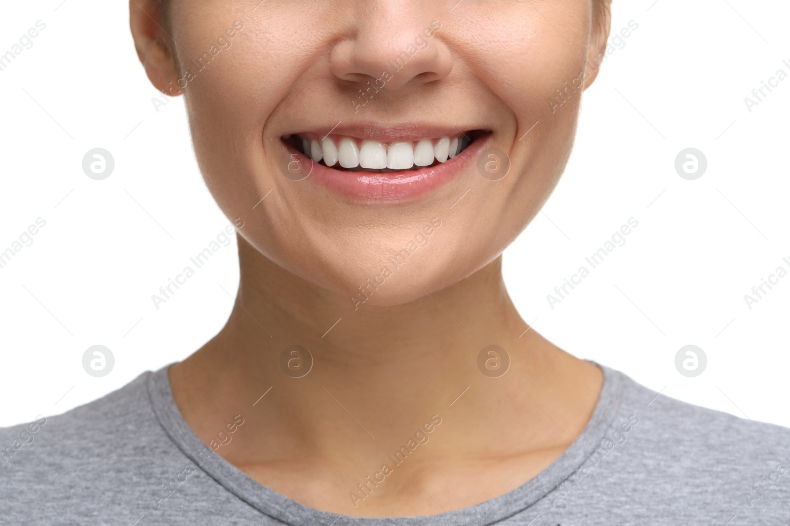 Photo of Woman with clean teeth smiling on white background, closeup