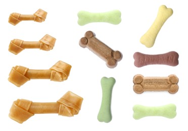 Set with different bone dog treats on white background