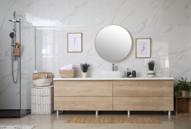 Photo of Bathroom interior with shower stall and counter. Idea for design