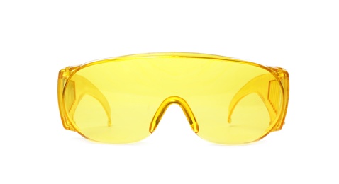 Photo of Protective goggles on white background. Construction tool