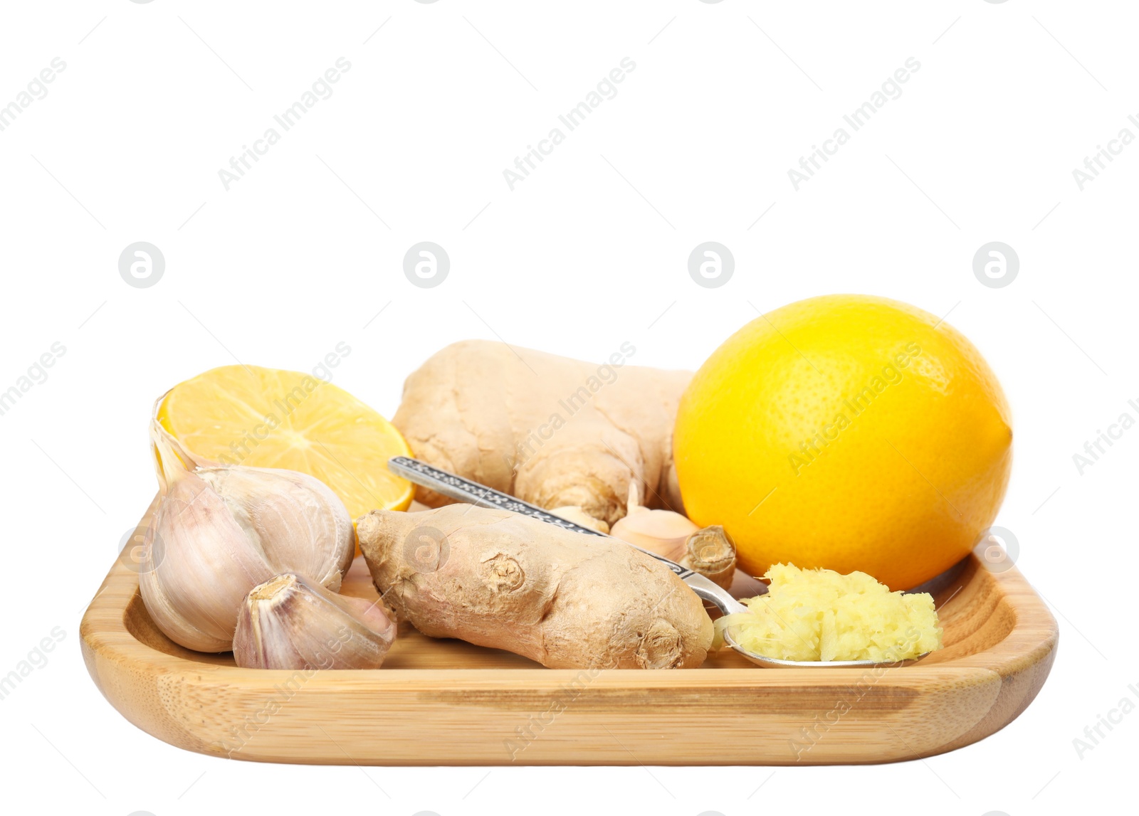 Photo of Fresh garlic and other natural cold remedies isolated on white