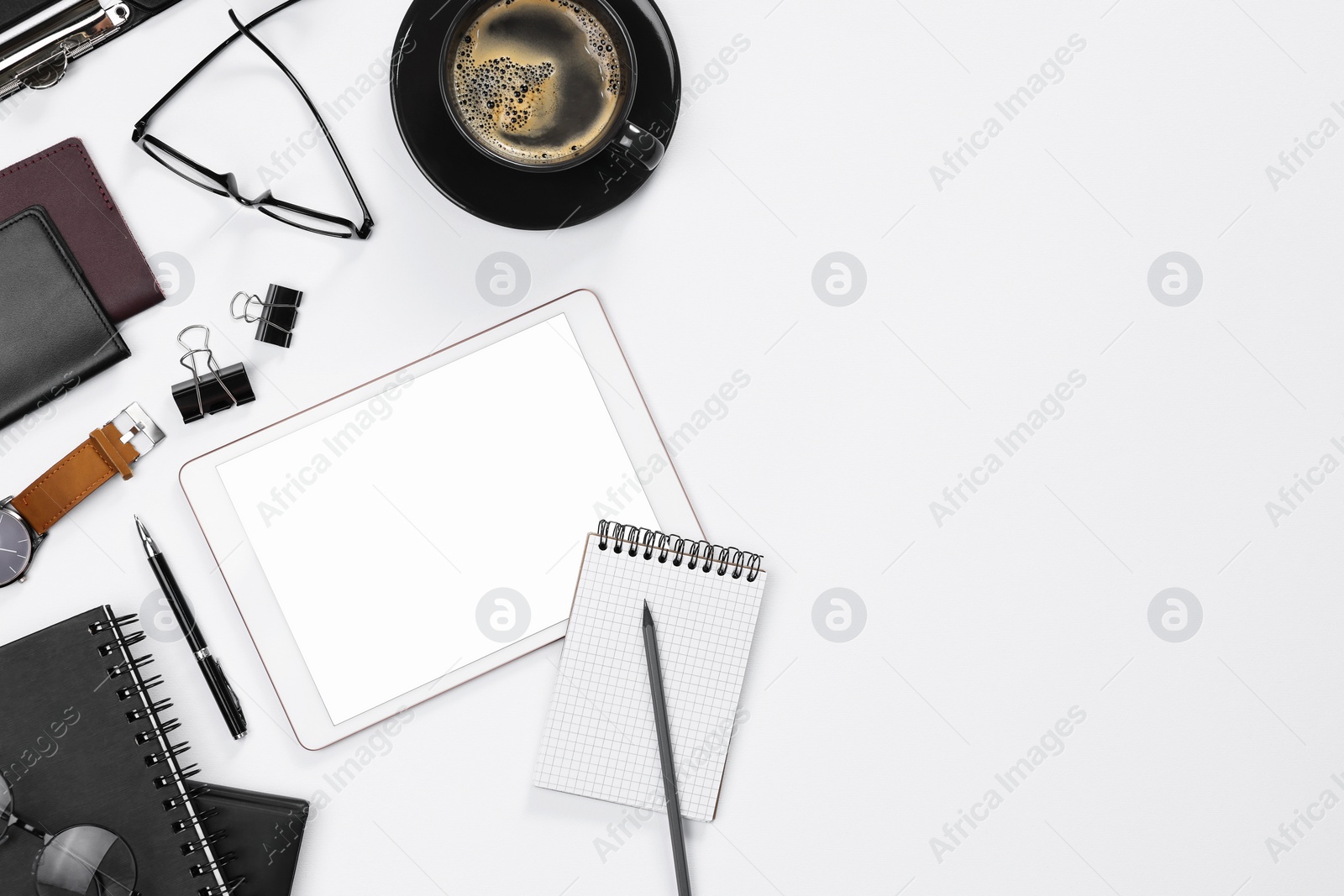 Photo of Flat lay composition with modern tablet on white background. Space for text