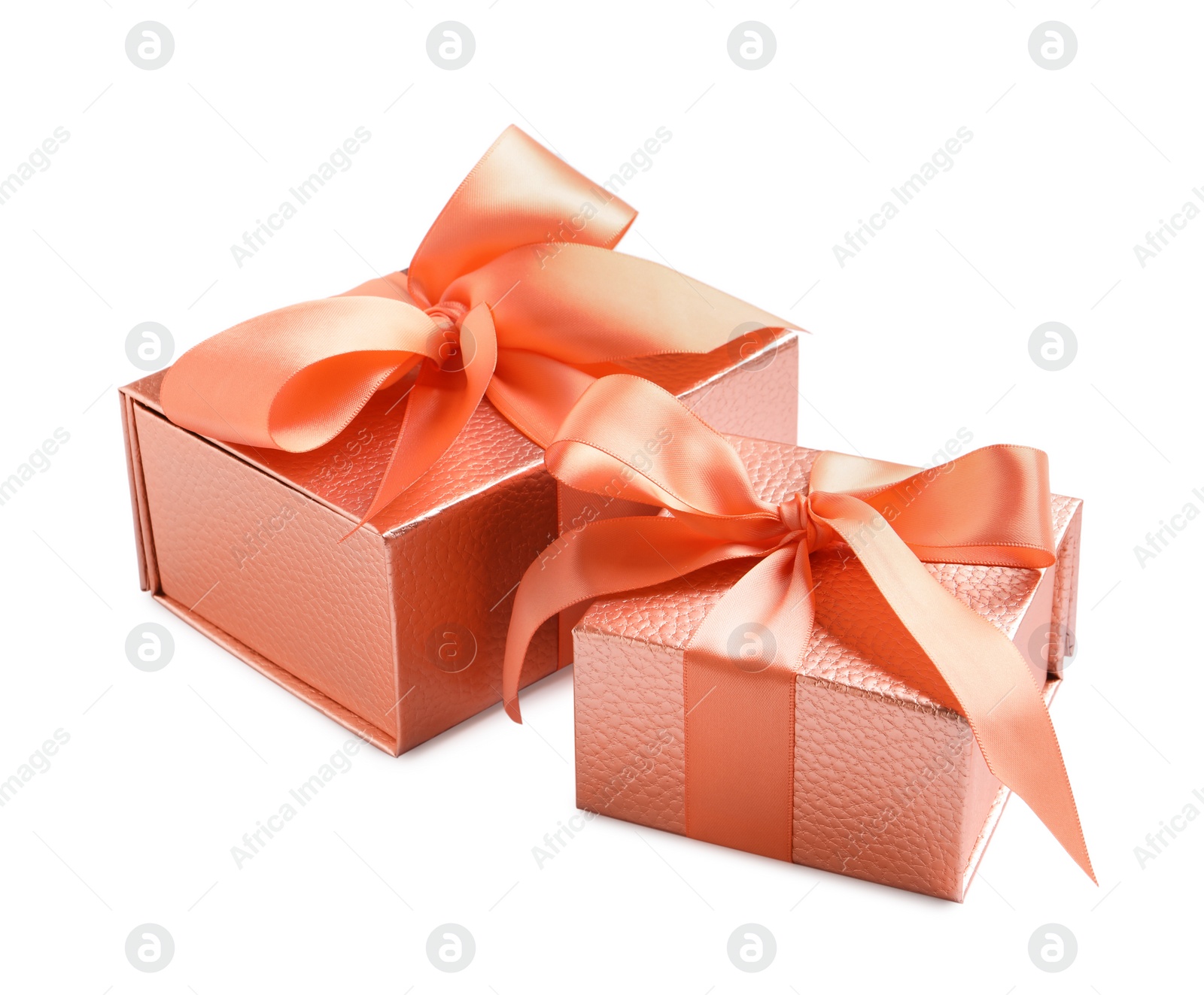 Photo of Gift boxes decorated with satin ribbon and bows on white background