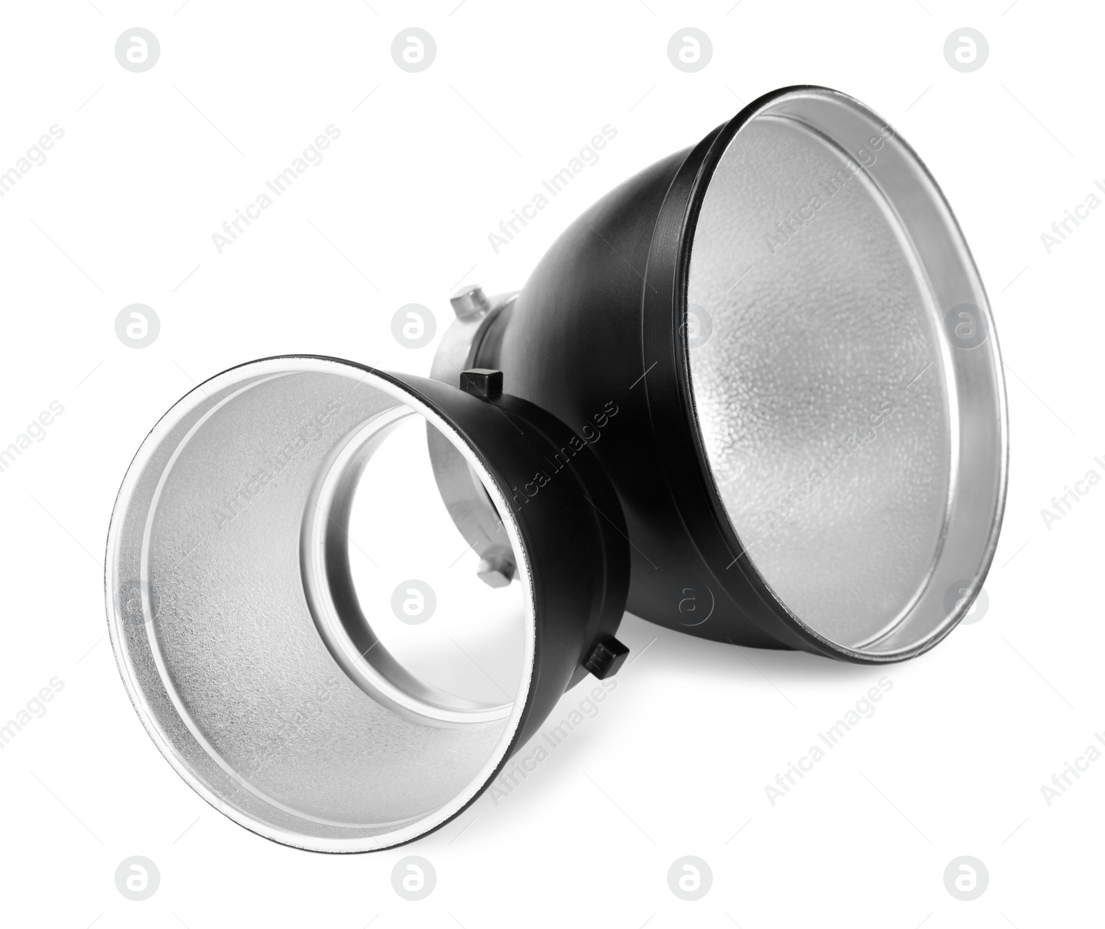 Photo of Studio flash lights reflectors on white background. Professional photographer's equipment