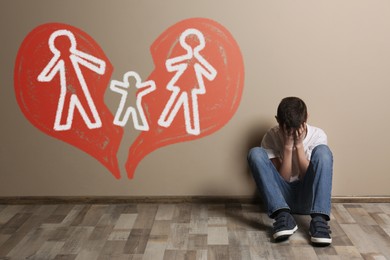 Image of Boy upset because of parents divorce at home. Illustration of broken heart and family