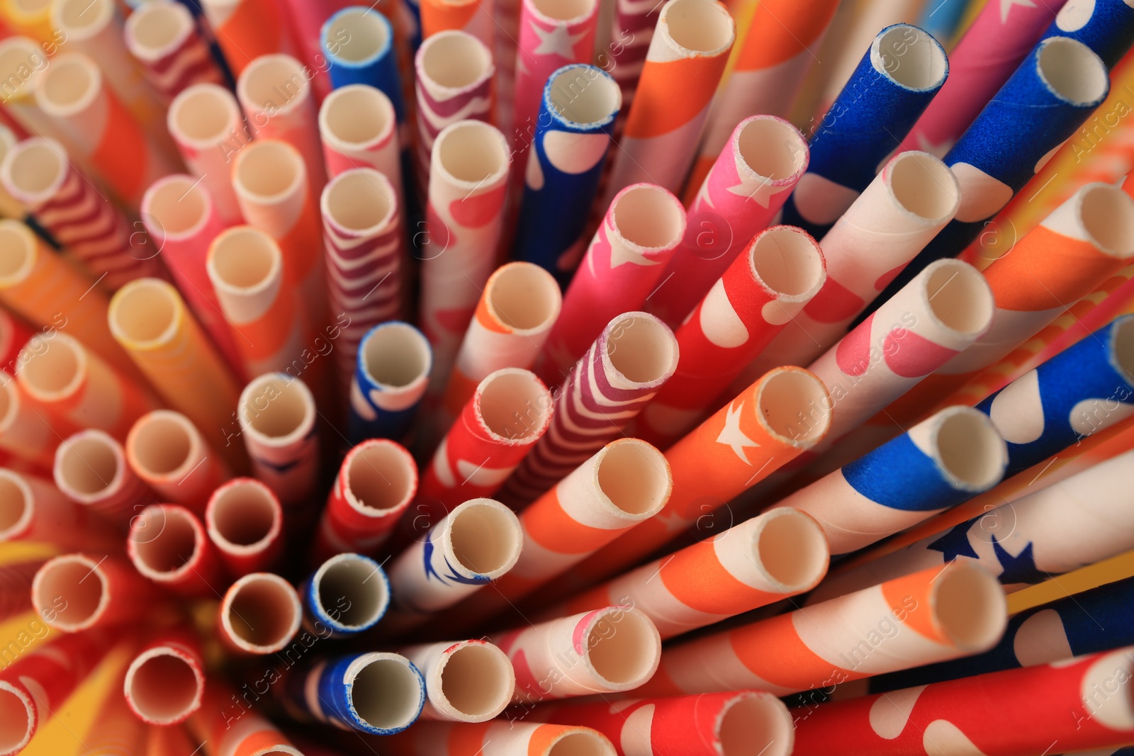 Photo of Many paper drinking straws as background, closeup