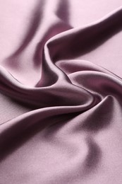 Photo of Texture of beautiful silk fabric as background, closeup