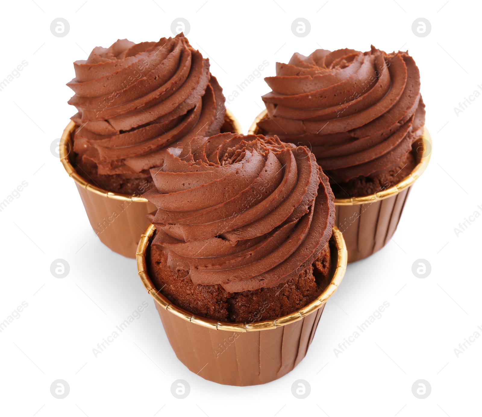 Photo of Three delicious chocolate cupcakes isolated on white