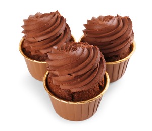 Photo of Three delicious chocolate cupcakes isolated on white