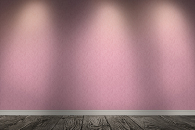 Pink wallpaper and wooden floor in room