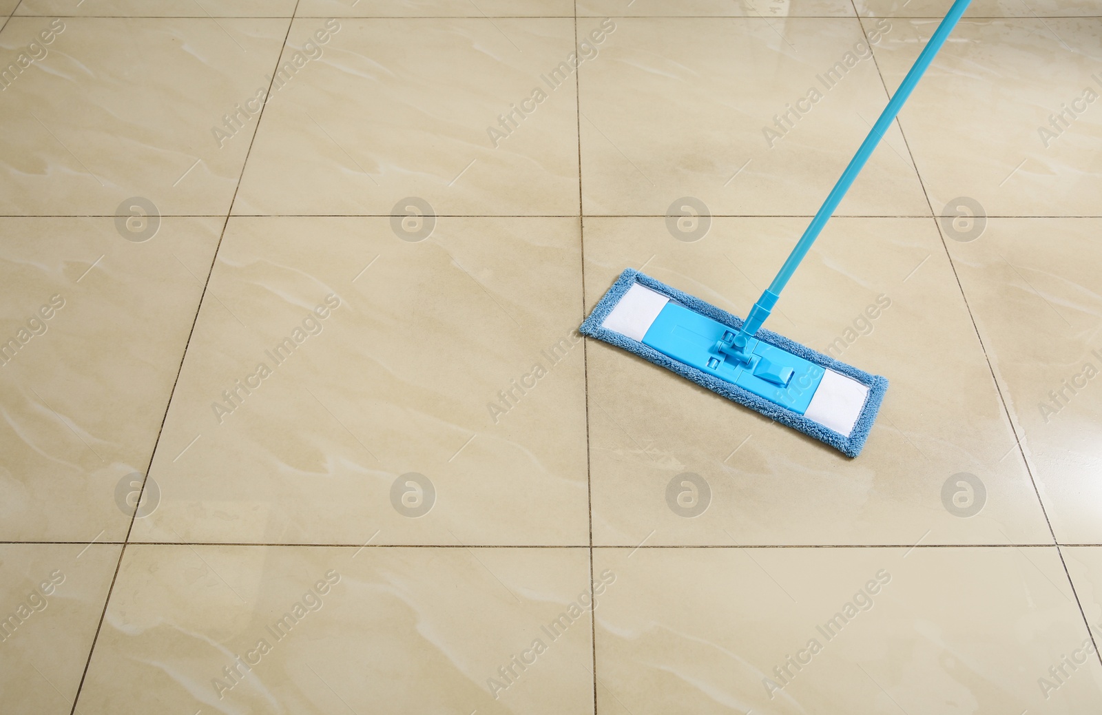 Photo of Washing of floor with mop. Space for text