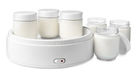 Modern yogurt maker with full jars on white background