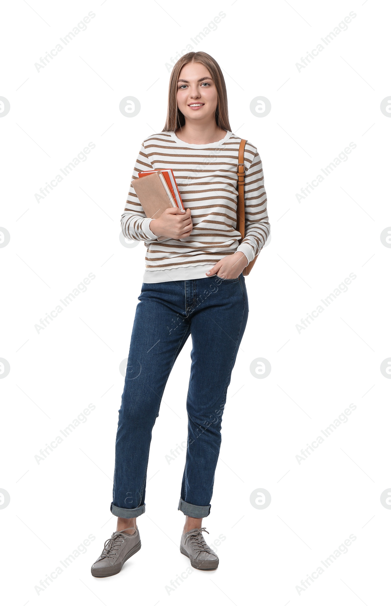 Photo of Teenage student with backpack and books on white background