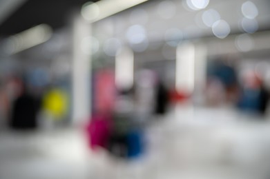 Blurred view of clothing store, bokeh effect