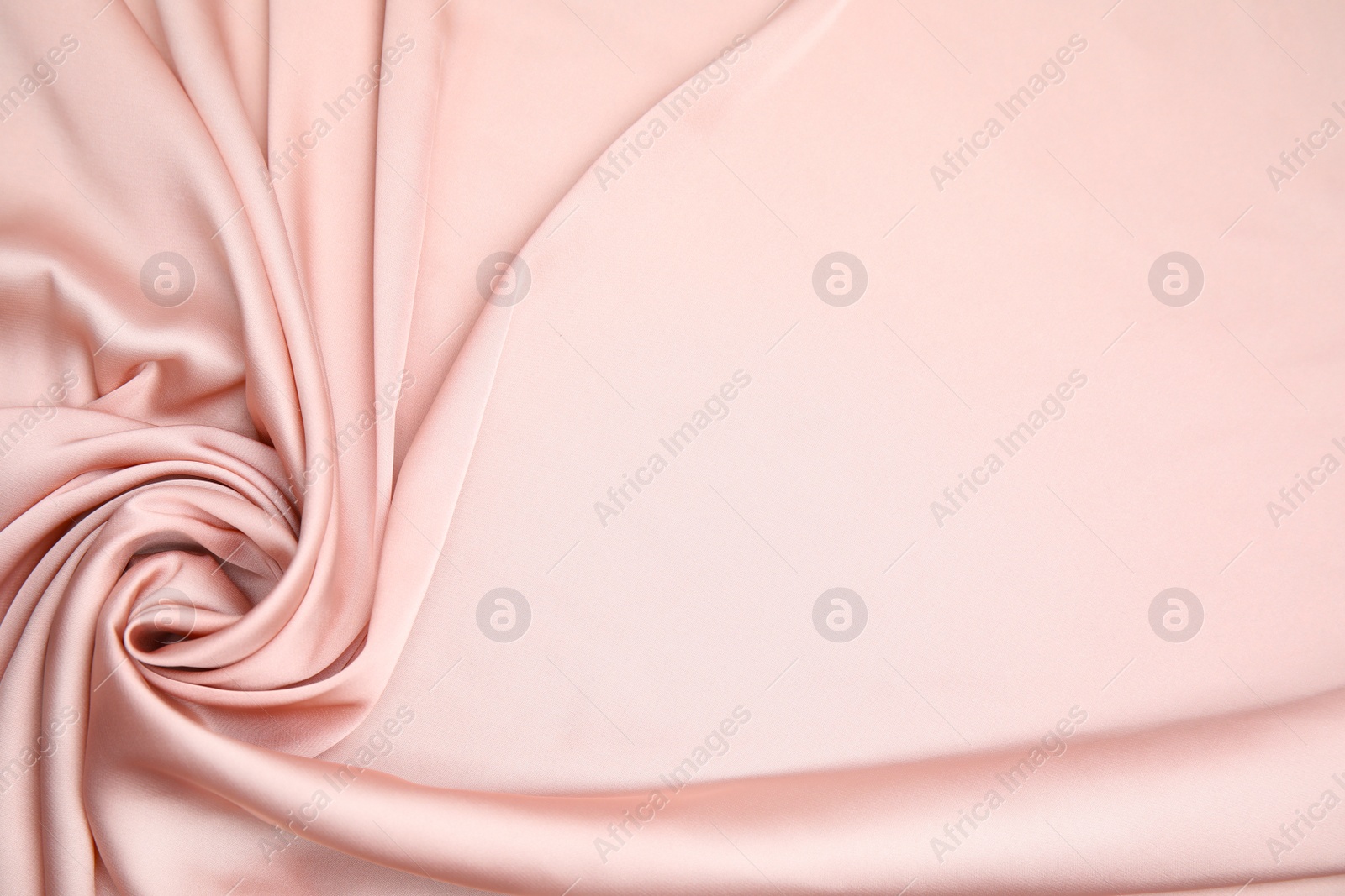 Photo of Texture of delicate pink silk as background, top view