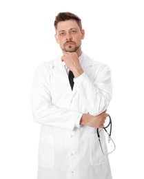 Photo of Portrait of pensive male doctor isolated on white. Medical staff