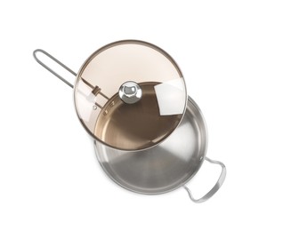 Photo of New shiny saucepan with glass lid isolated on white, top view